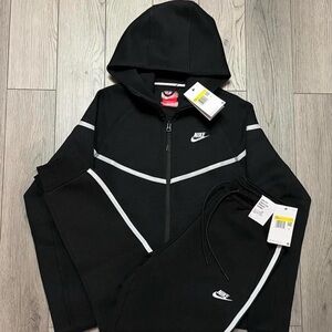 nike aw77 hoodie with arm pocket